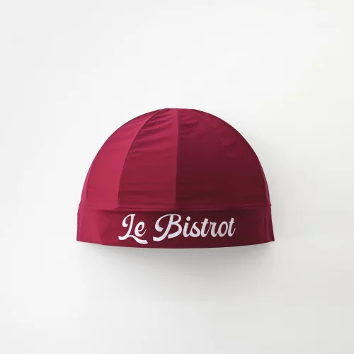 Burgundy canopy reading Le Bistrot on a white gallery wall &mdash; Egon Van Herreweghe, The Menu